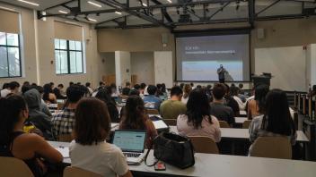 Derek Stimel, Associate Professor of Teaching, teaching an intermediate Macroeconomics class in Walker Hall.
