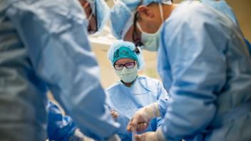 Dr. Diane Farmer in the middle of a surgery. 
