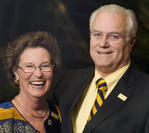 Jacque and Wayne Bartholomew grinning.