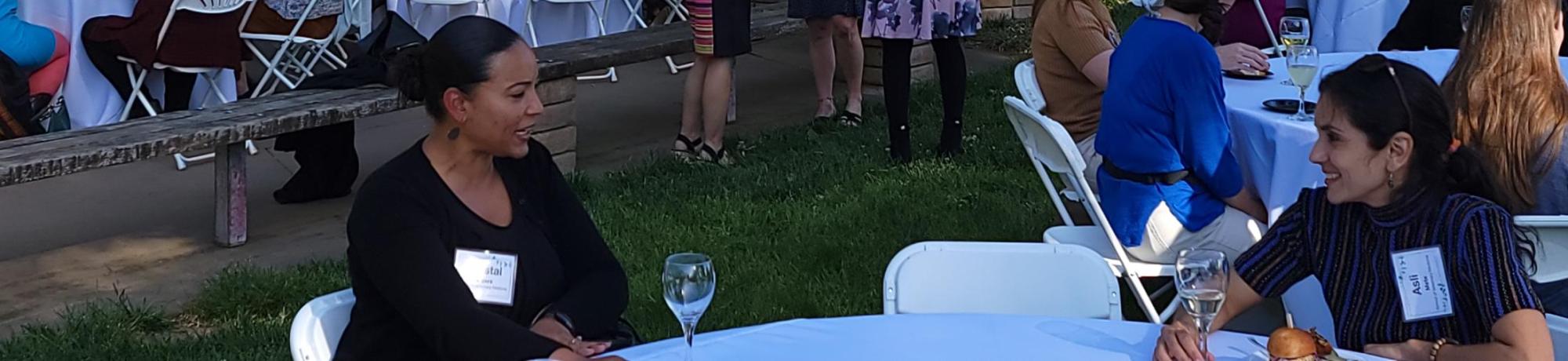 Women faculty at a networking reception